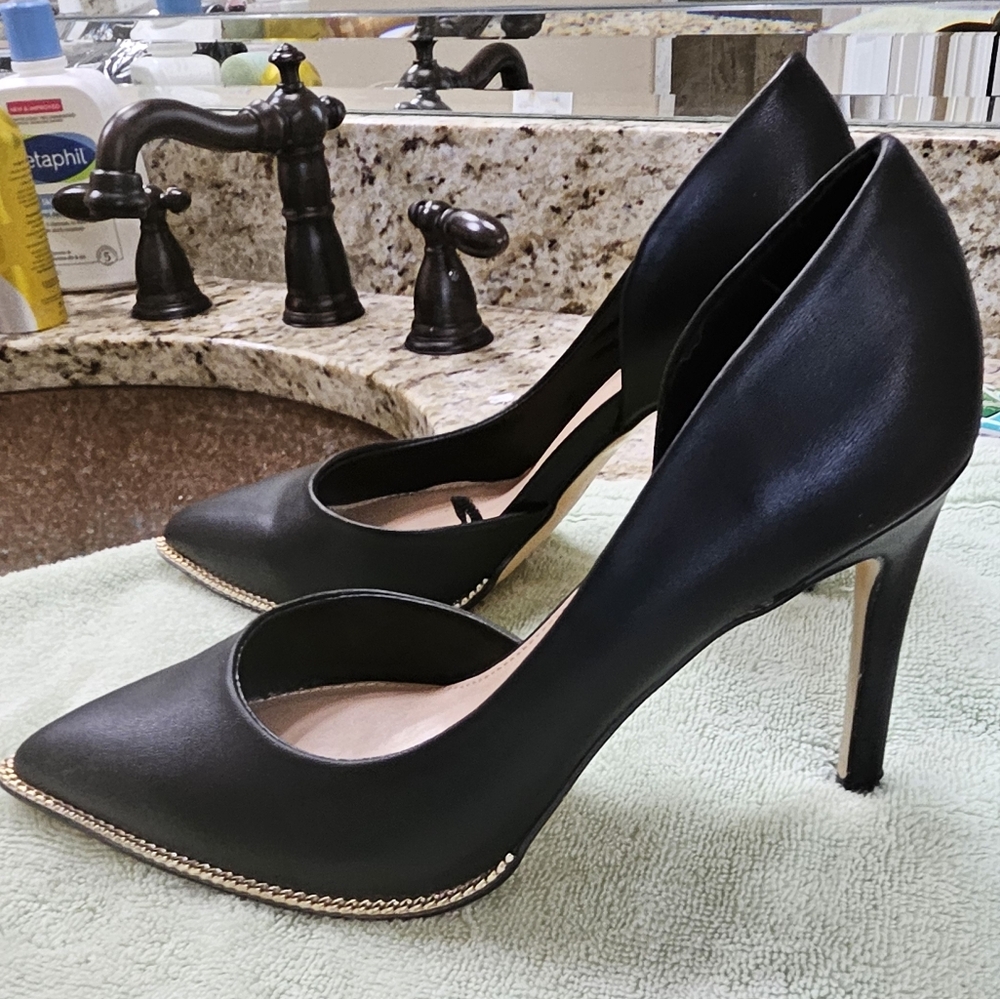 Black and gold heels